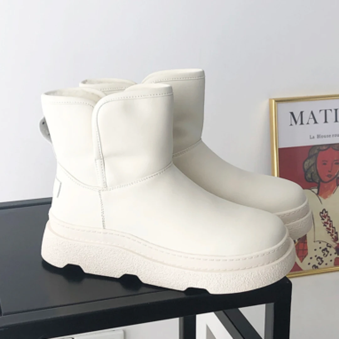 冬季加厚保暖真皮羊毛混合绒翻边雪地靴女短筒加绒棉靴