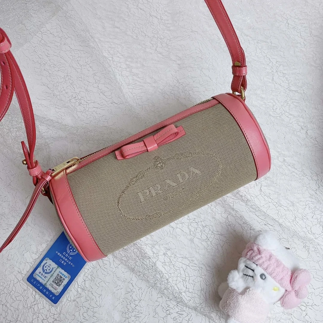95新 Prada/普拉达 夏七中古/Prada普拉达蝴蝶结圆筒斜挎包