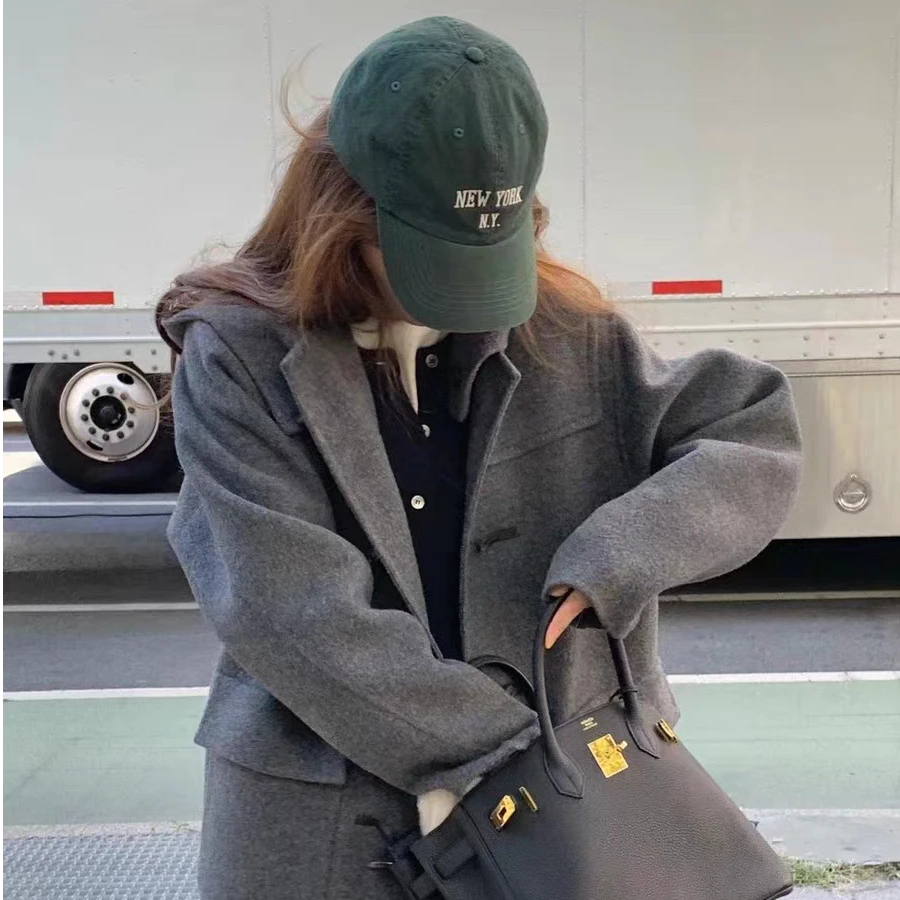 ou*ce长款牛角扣大衣