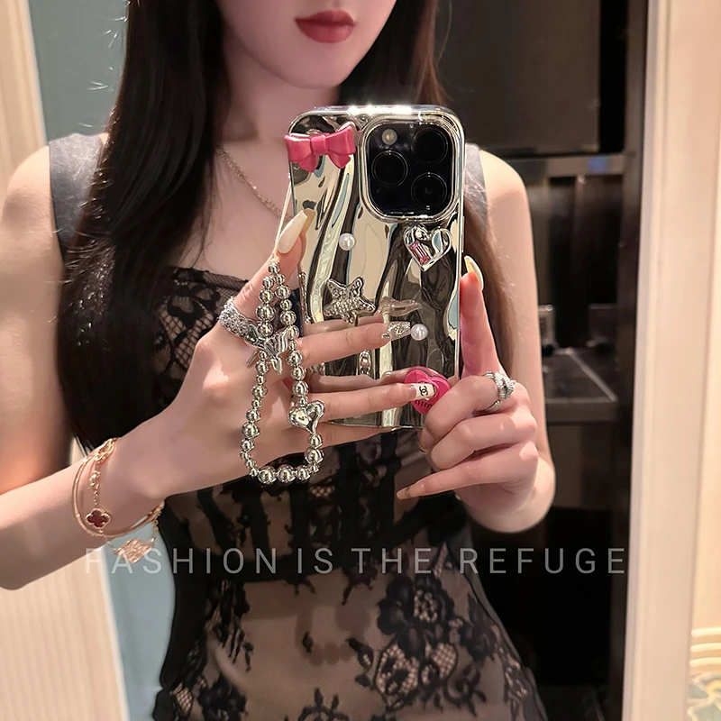 蝴蝶结苹果手机壳15promax镜面iPhone14硅胶13网红女新款12创意潮