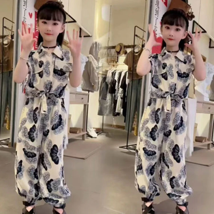 艾米果服饰2835黑白蝴蝶绑带无袖套装617