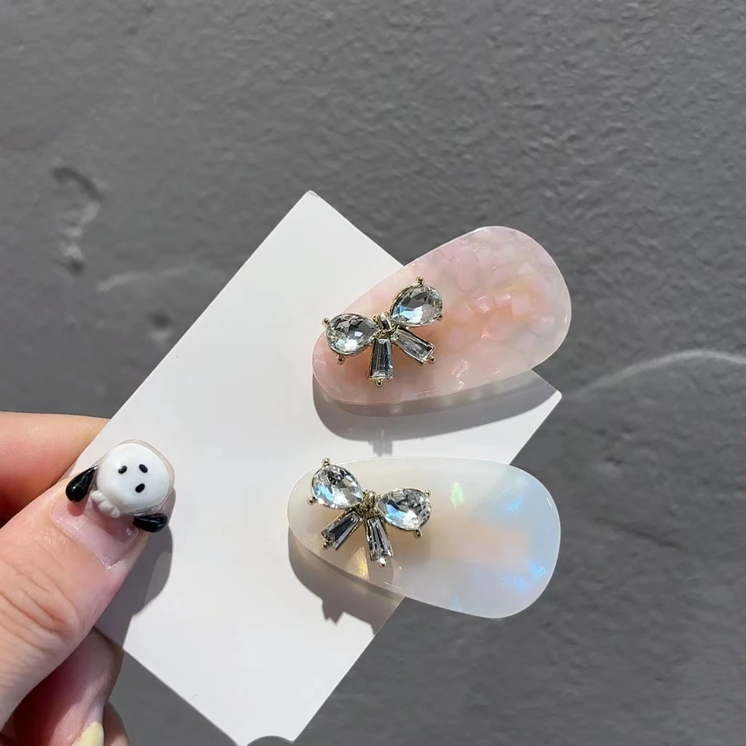 设计款闪闪蝴蝶结发夹一对Y60