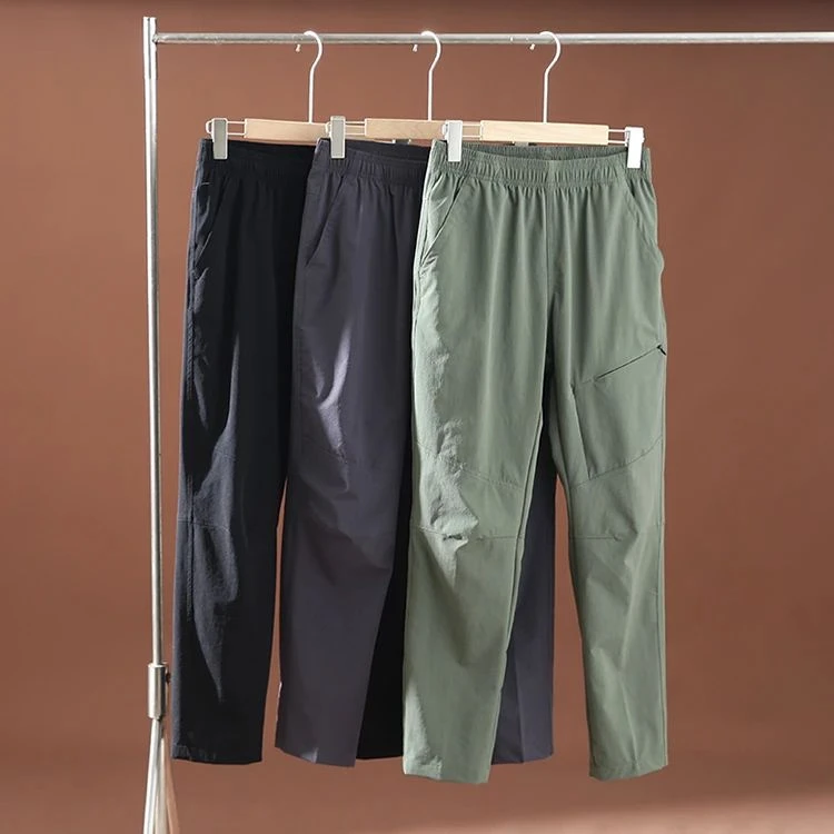 男士秋季轻薄透气户外徒步软壳裤微锥速干裤薄款宽松登山裤通