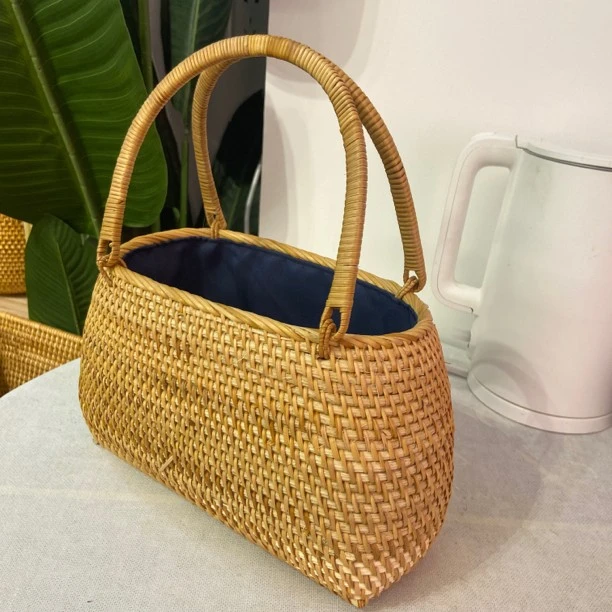 F103秋藤美越南藤编 23*13*17经典椭圆手提包小号手工编织手拿包