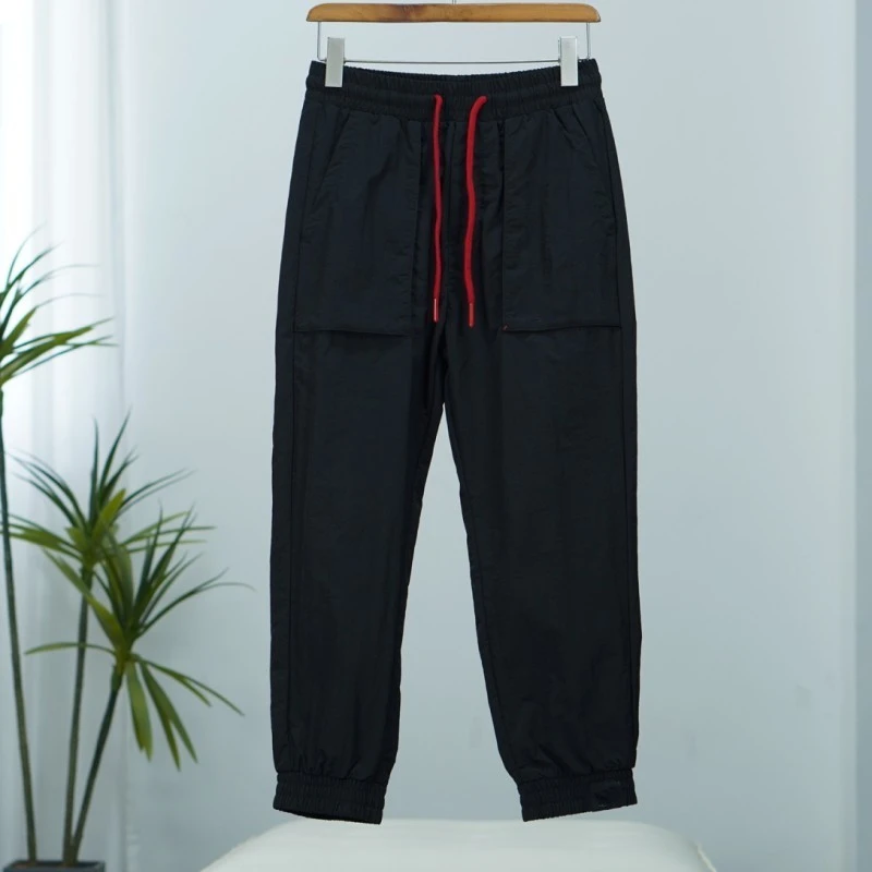 嘴系列  Y557  时尚撤柜梭织九分裤黑色PFAPT211014M