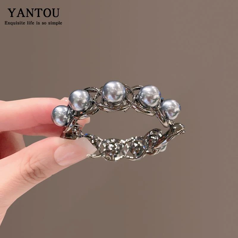 枪黑高级感珍珠丸子头抓夹女后脑勺气质发夹大号盘发神器夹子头饰