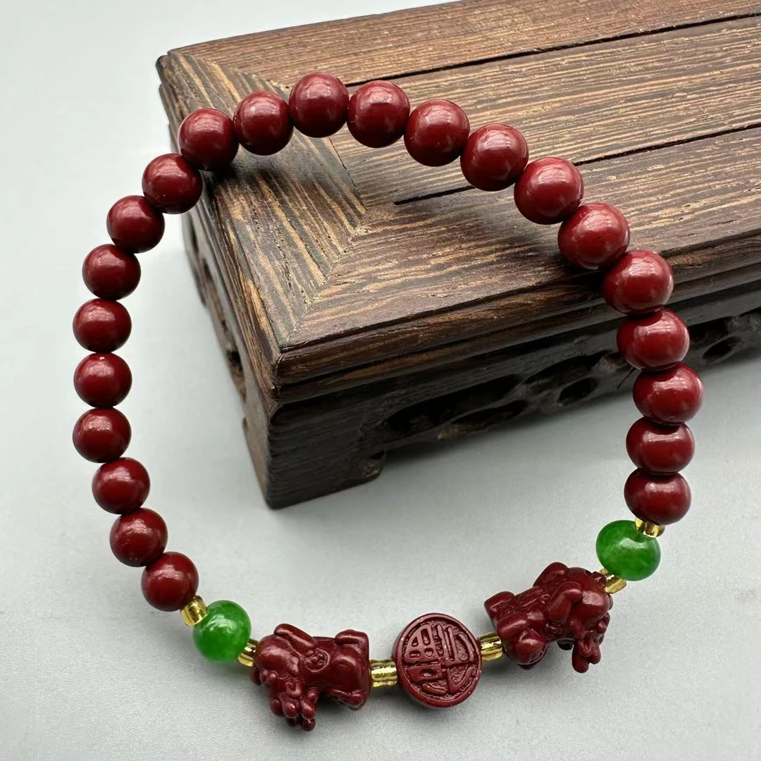 含辰砂工艺品ZA835-紫色配雕刻貔貅配绿色珠子6mm手串