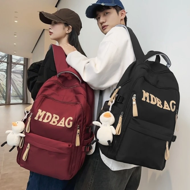 初中生书包韩版大容量双肩包女大学生双肩背包男士旅行登山包防水