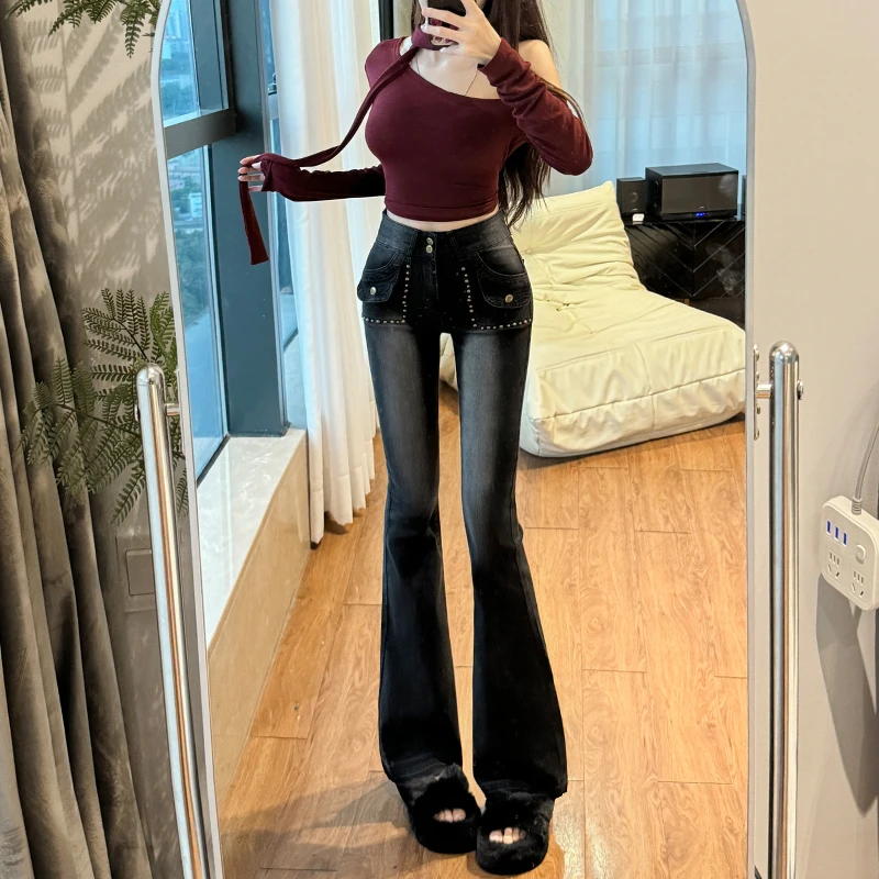 黑色重工钉珠微喇叭牛仔裤女秋季新款高腰显瘦修身弹力设计感裤子
