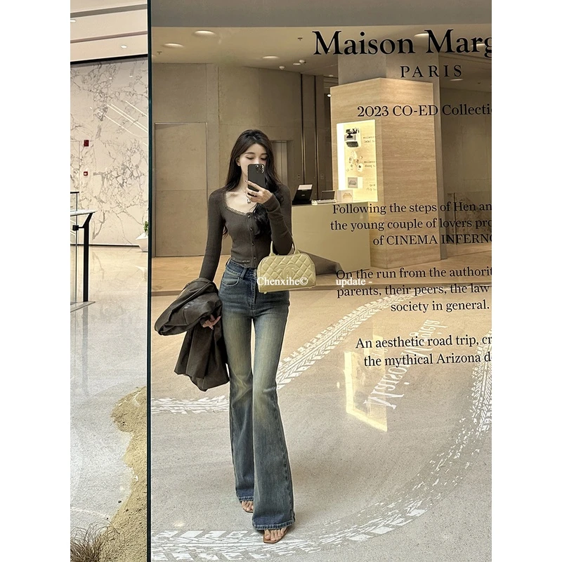 何晨曦 复古蓝色双排扣微喇牛仔裤女高腰修身显瘦喇叭裤 TK09305