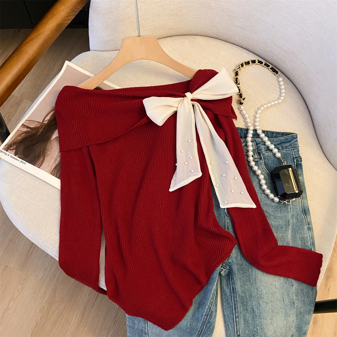 法式时尚休闲宽松一字肩套头针织衫秋季女装蝴蝶结修身长袖上衣女