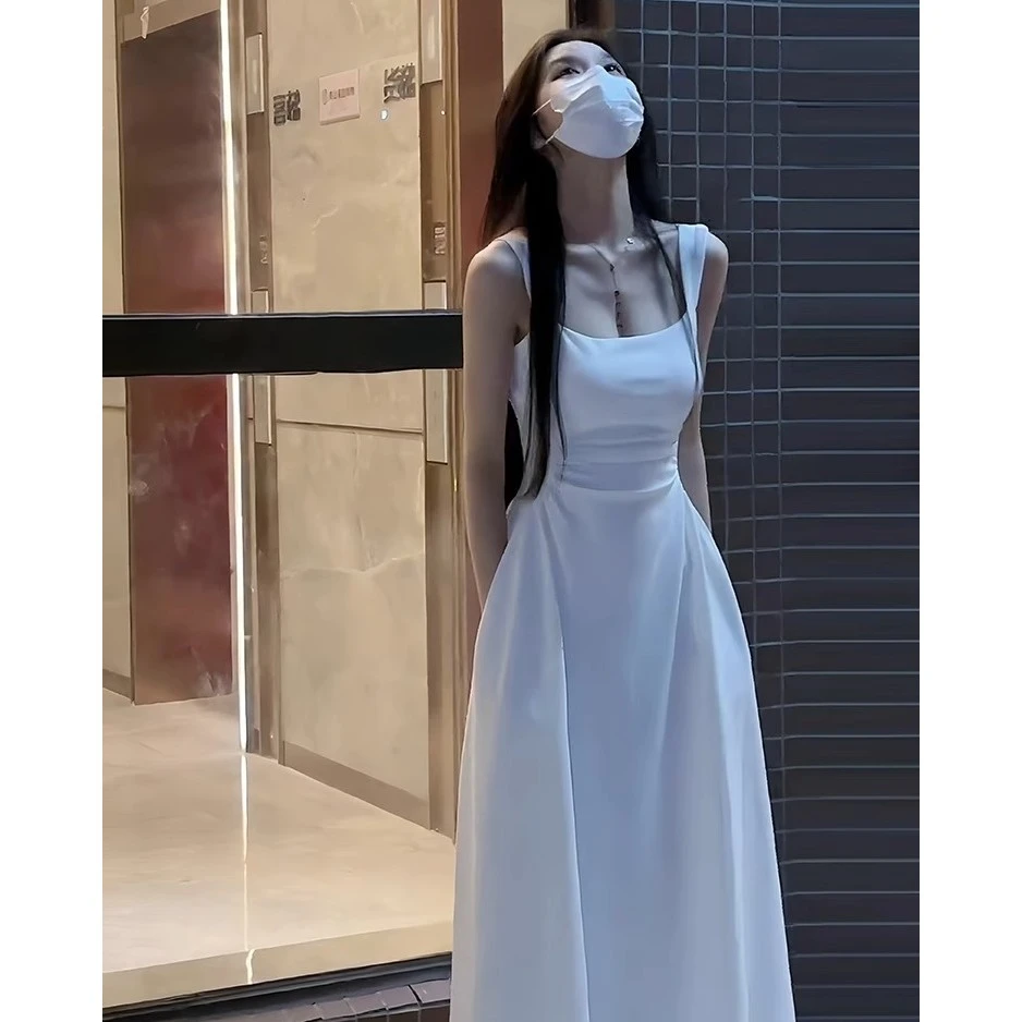 连衣裙显瘦气质夏季法式小众设计感收腰小个子白色吊带裙长裙轻奢