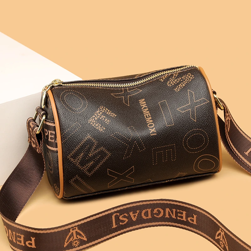 7119单肩包女2024年新款轻奢枕头包印花女包休闲斜挎圆筒包