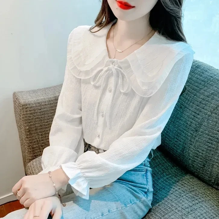 衬衫女2023新款网纱拼接娃娃领单排扣开衫上衣气质百搭系带打底衫