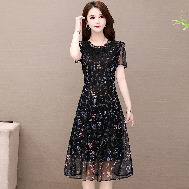 妈妈装中老年修身过膝连衣裙夏季新款中长裙短袖大码碎花大摆裙