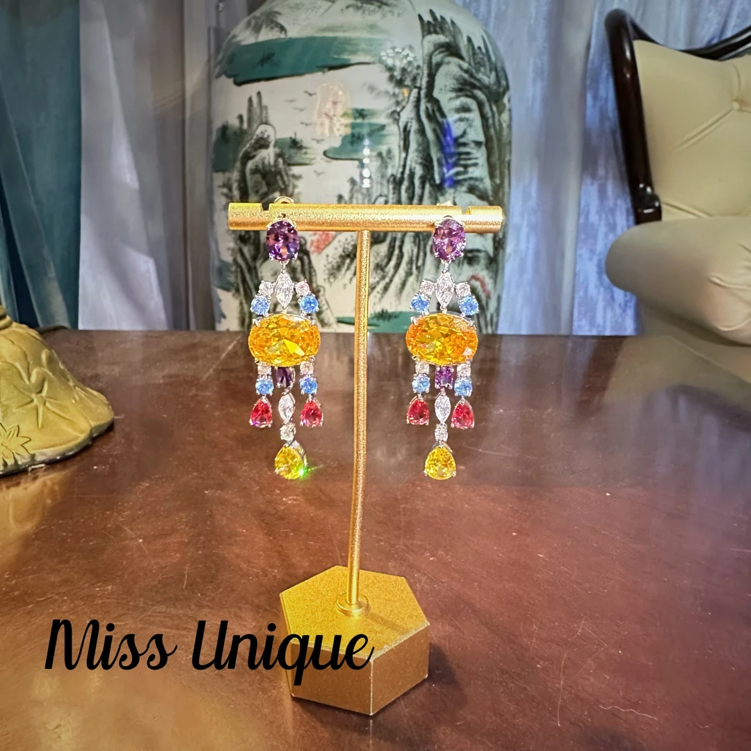 E8619瑞士M家黄色椭圆流苏耳环