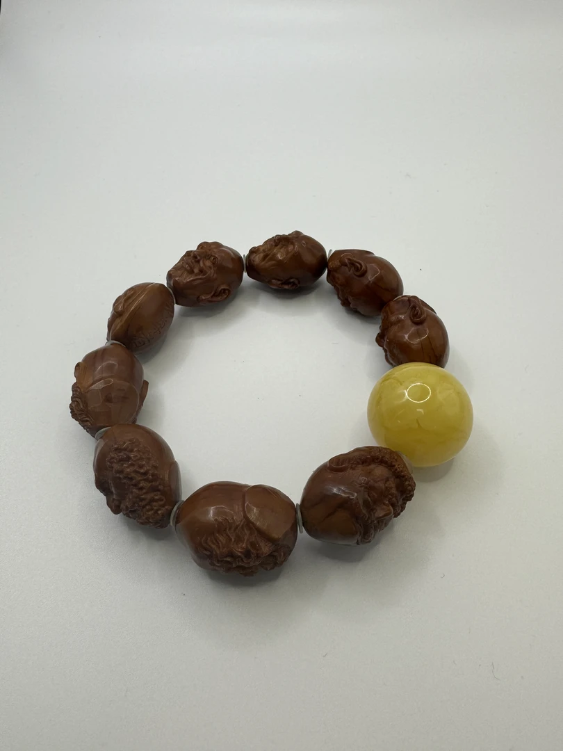 橄榄核雕刻罗汉手串