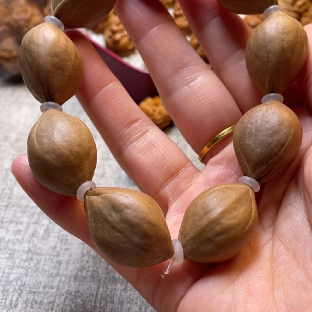 【闪购商品】橄榄核雕用****9素串