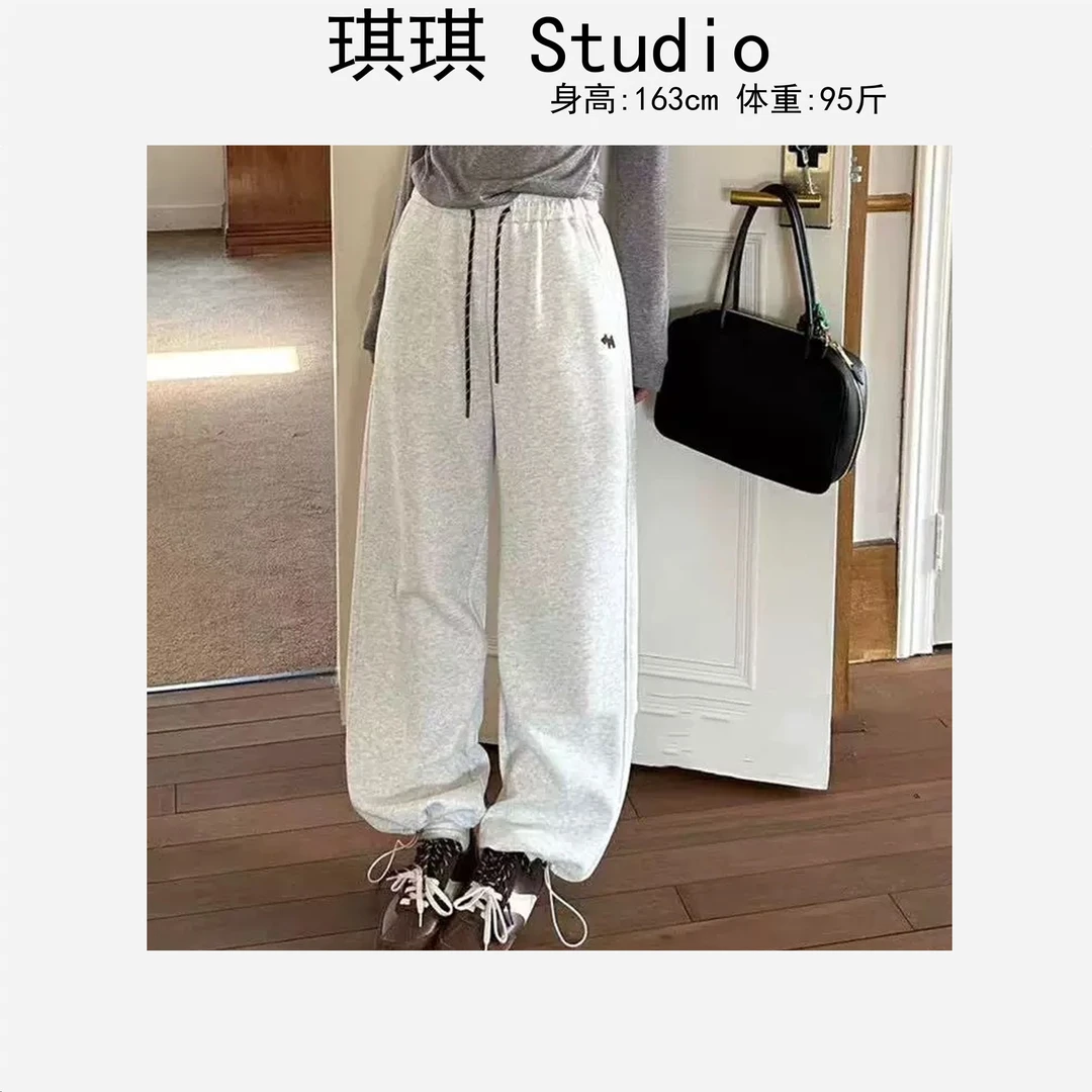 春季新款气质时尚松紧腰抽绳刺绣狗狗图案两穿减龄休闲裤8558-C