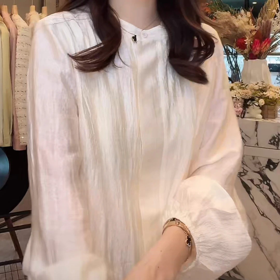 设计感纽扣纯色圆领衬衫女2025春季爆款洋气优雅风外穿长袖衬衣