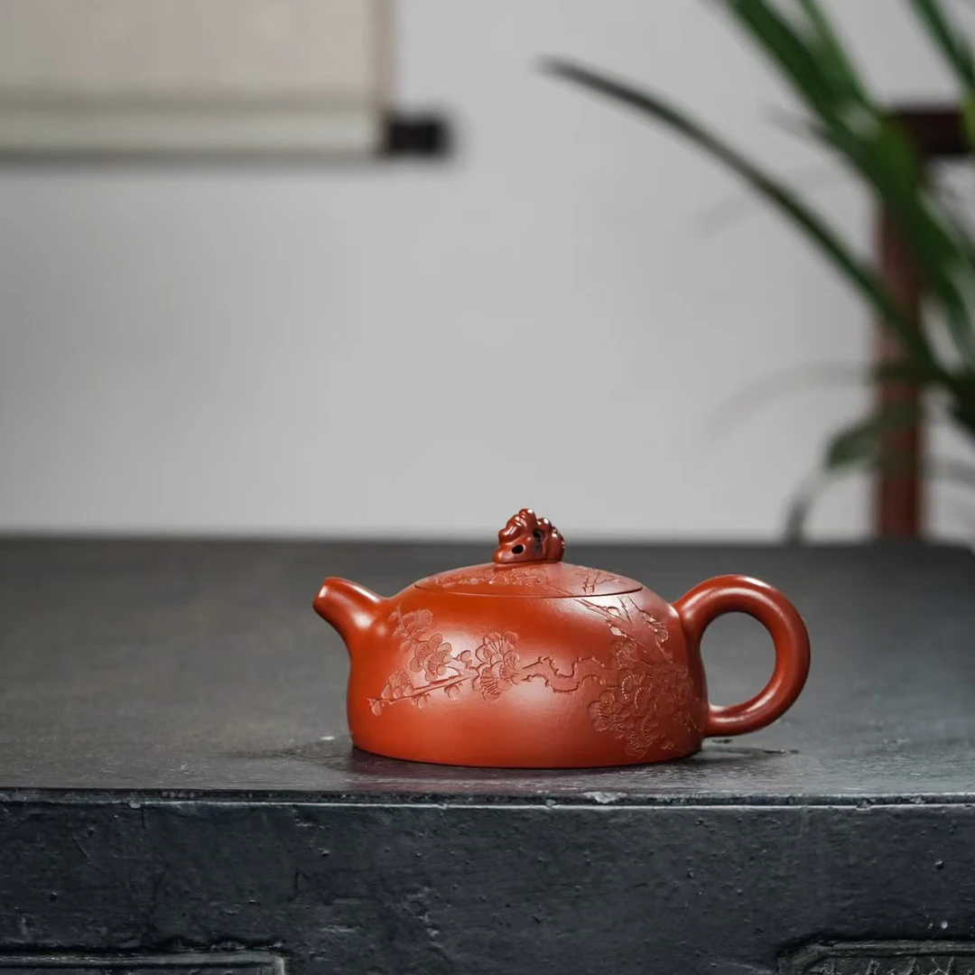 朱泥梅花刻绘太湖石半月  紫砂壶