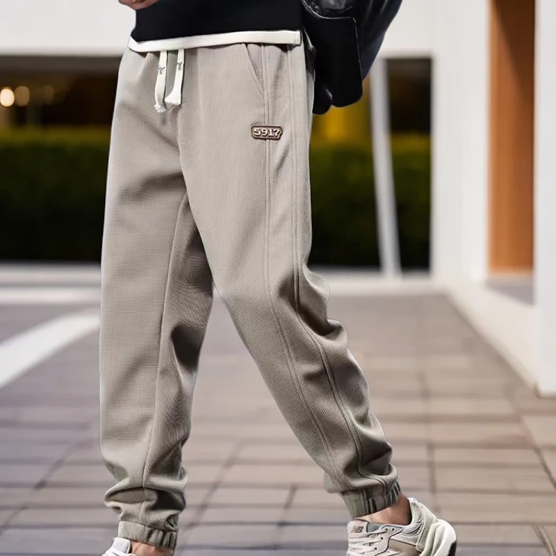 秋冬新款时尚百搭卫裤潮流美式宽松百搭长裤男士潮牌运动束脚裤