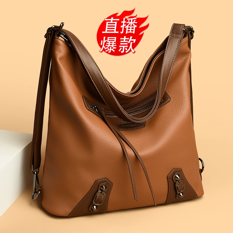 2025大容量真皮通勤女包牛皮托特包多功能单肩斜挎双背简约水桶包
