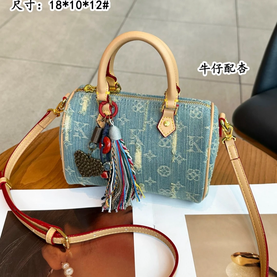 【云姐专拍】春夏新款时尚牛仔风斜挎枕头包