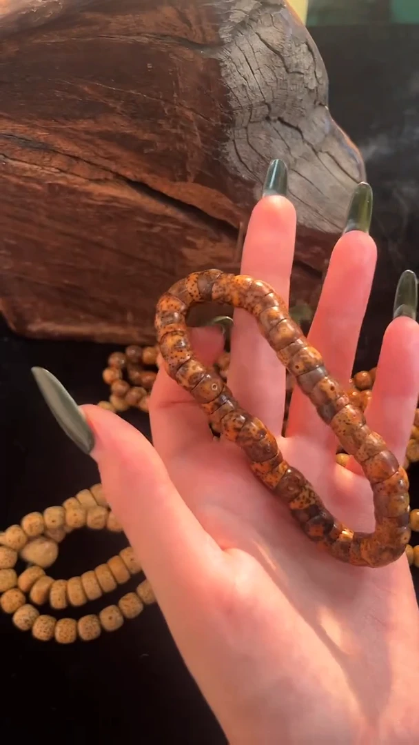 手串星月菩提精工级深珀花皮桶形大肠手持（B）10*7