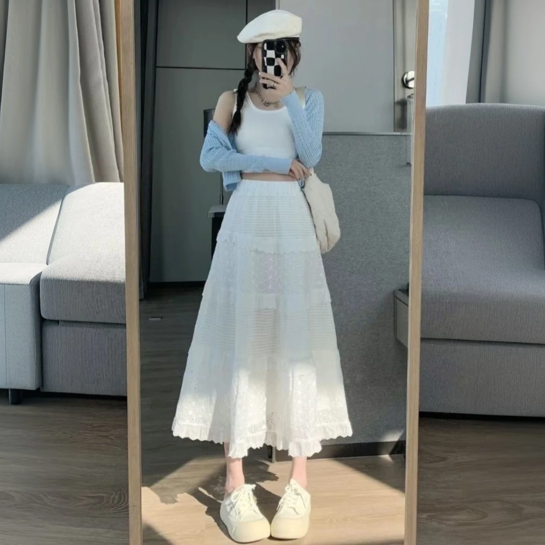 白色蛋糕裙穿搭2025新款春季温柔风设计感A字裙高腰半身裙长裙子