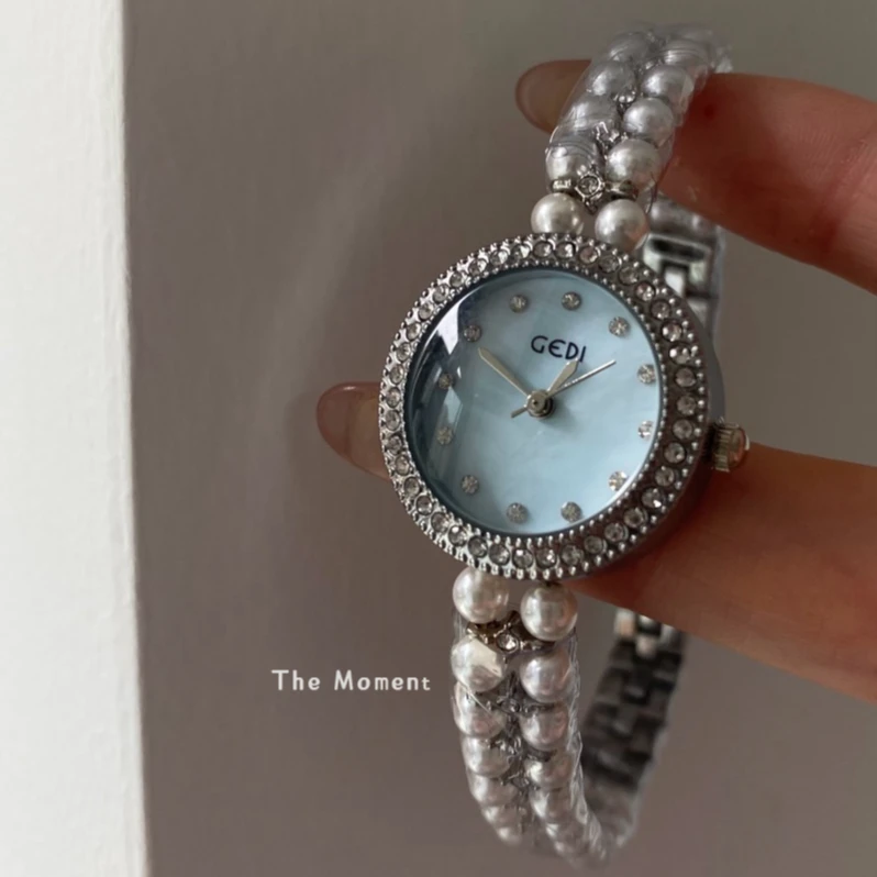 多巴胺珍珠链圆形表盘气质小众时尚高级感时尚百搭防水手链款女表