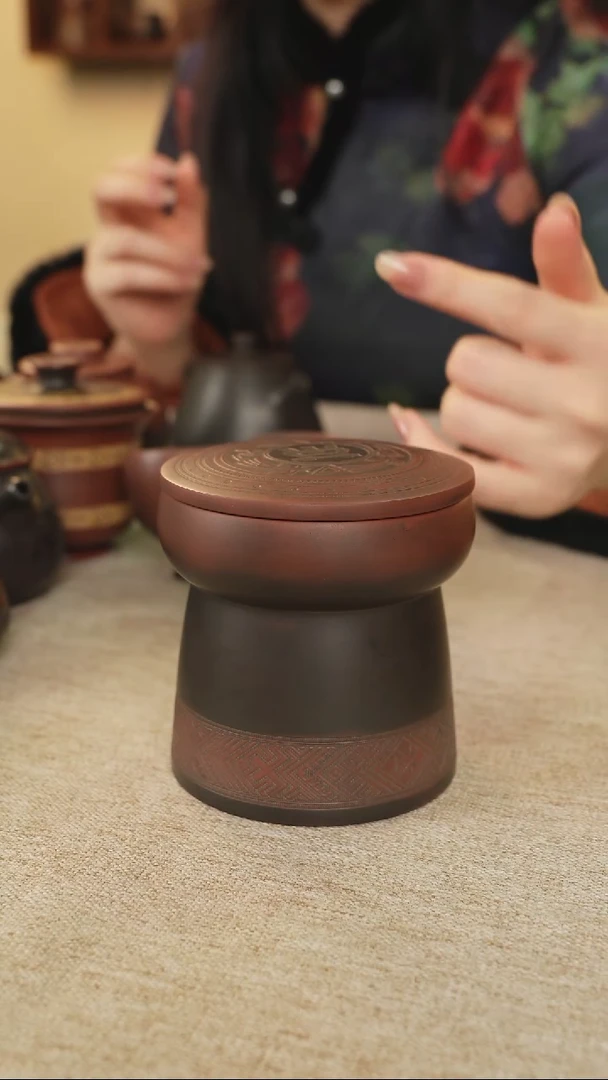 罐牛****?广西钦州坭兴陶铜鼓印象