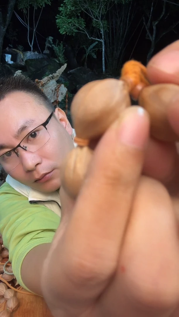 手串橄榄核张*辉19.25头货梅林铁核