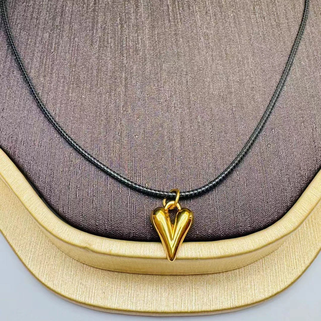 90#足金999 心尖尖吊坠 皮绳