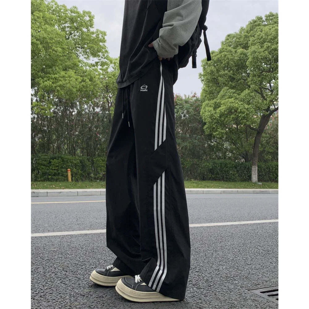 2025夏季爆款拼接条纹休闲裤男生户外运动冰丝速干痞帅宽松直筒裤