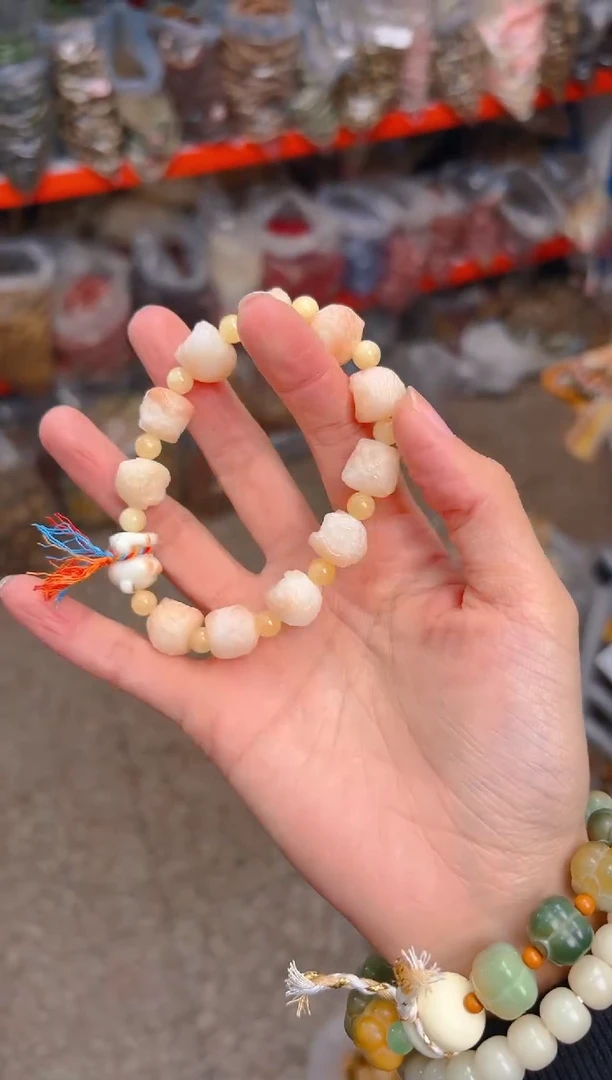 吊坠菩提根/象牙果粉色醒狮单圈