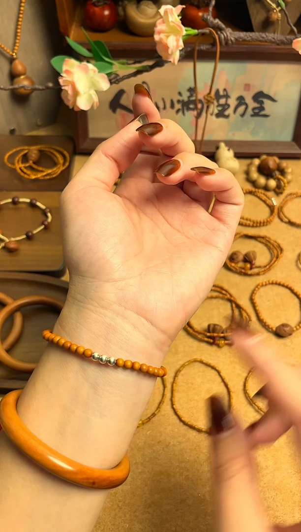 桃核银珠   一物一拍