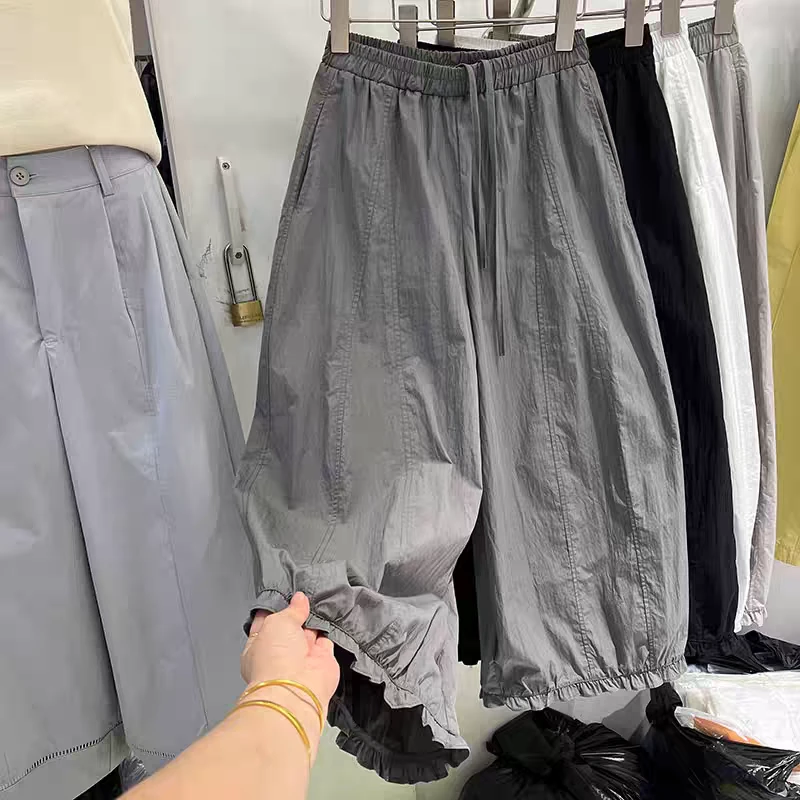 灰色薄款冰丝速干气球裤女夏日2025新款木耳边宽松九分阔腿灯笼裤
