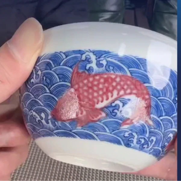 一品德窑青花釉里红海浪鱼纹杯子