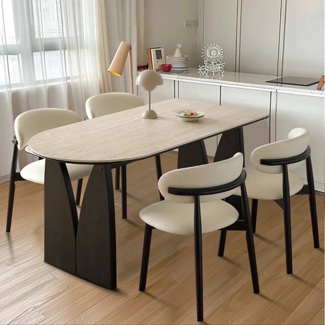 将末法式复古洞石岩板实木餐桌小户型椭圆餐桌椅2025现代简约款