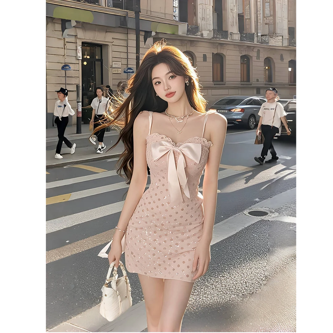 纯欲设计感粉色蝴蝶结缎面吊带连衣裙女法式轻熟性感修身包臀短裙