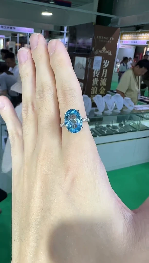 银S925镶嵌戒指托帕石10*14mm妖姬蓝18ct