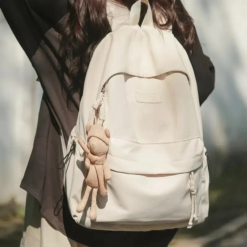 背负式日韩兔子简约风纯色书包百搭休闲双肩背韩版