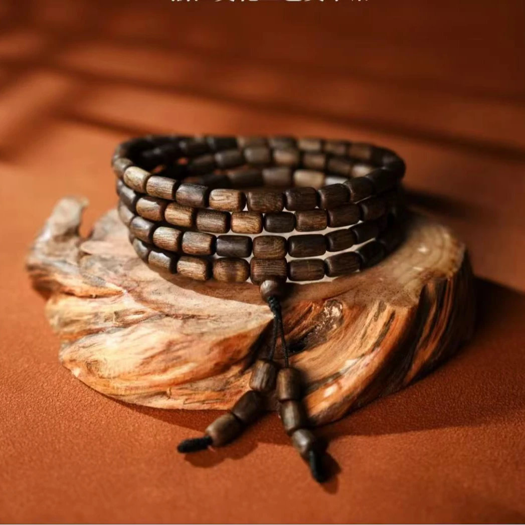 沉香【霸王岭】海南莺歌绿奇楠随型桶珠多圈沉水