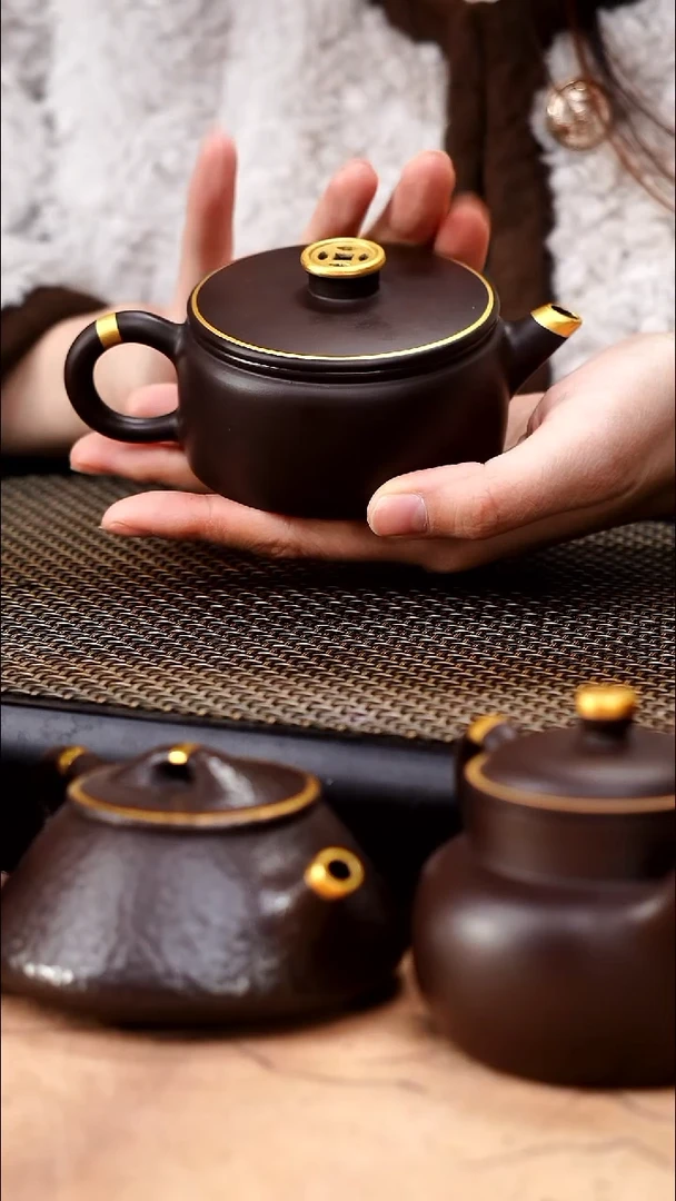 茶壶紫砂四号井茄皮紫泥描金钱币钮汉瓦150cc