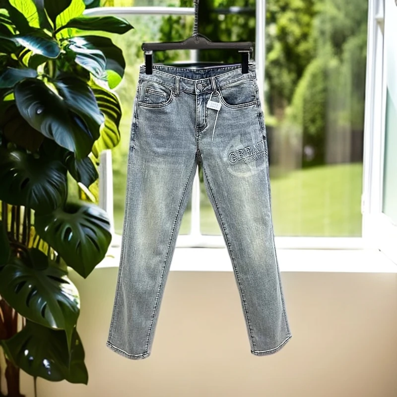 娜罗普西时尚通勤百搭男士水洗牛仔裤夏季新款字母印花蓝色小脚裤