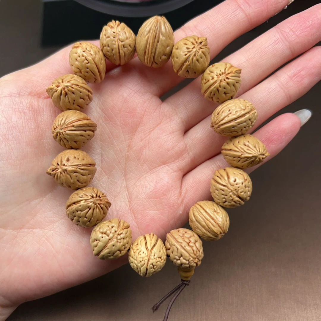 天然野生桃核手串 502