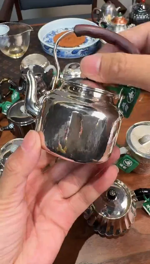 -呆坐手敲旧时光童年小提梁壶