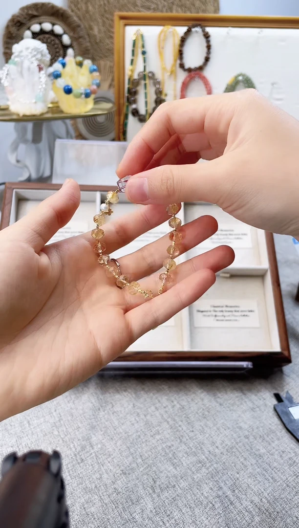 水晶手串合金嘻***?黄塔晶切面