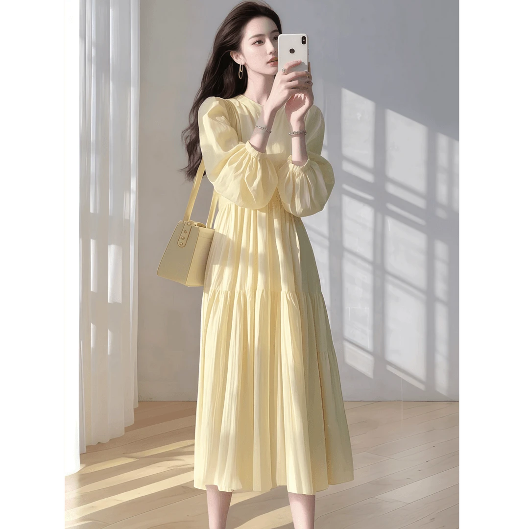 法式黄色宽松长袖连衣裙女2025早春新款度假风仙女气质显瘦长裙子